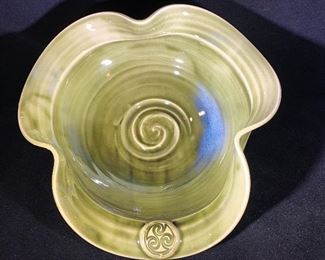 hand made bowl (look for taller vase that is by the same potter) with hints of blue glaze 