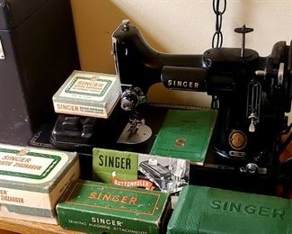 Singer Featherweight sewing machine with original case,  several accessories, original book, etc...