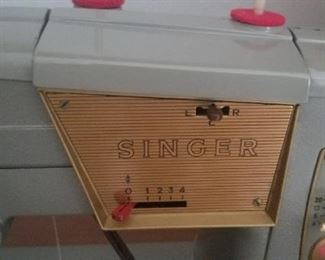 Vintage Singer sewing machine with Mid Century cabinet