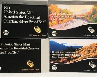 4 sets of Silver Proof quarters  
2011 
2012 
2013 
2014 