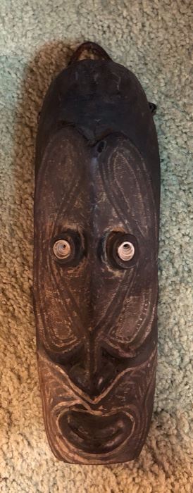 New Guinea tribal mask with shell eyes