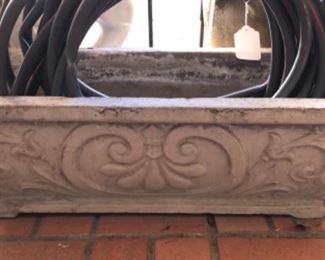 Concrete planter and garden items.