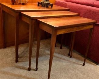Danish modern Mid Century nesting tables. Rosewood, pencil-thin tapering legs.