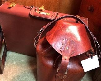 Vintage leather bucket bag. 

Vintage atlas leather briefcase. Super nice, burnished leather, gold plated hardware and combination lock. 