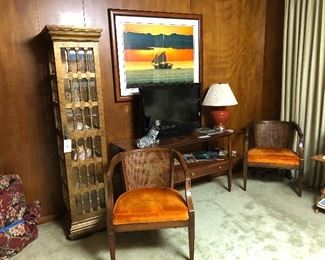 MCM cane back barrel chair, Hollywood Regency six shelf curio cabinet, Igor Medvedev Signed and numbered Serigraph, 32 inch flatscreen HD TV with remote, Mid Century Willet Solid  Transitional Cherry Server. MCM Italian ceramic zebra bank. 
