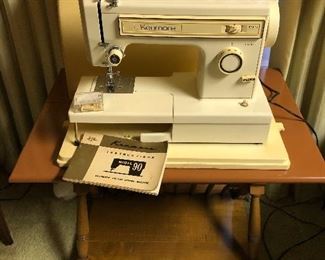 Kenmore 158 series, model 90 all metal case and parts, heavy duty sewing machine. Works. Includes foot pedal and locking case.

Vintage maple Tell City Andover magazine table, hoof feet