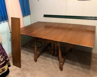 Mud Century Haywood Wakefield Maple drop leaf table with leaf. 
With leaf 72”, 
Without leaf 63”, 
fully dropped, 26”
