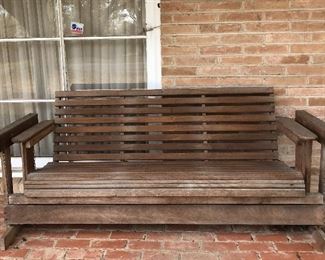 6 foot glider, three person seating, moves fluidly, solid as a rock!