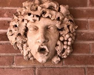 Bacchus face concrete wall hanging