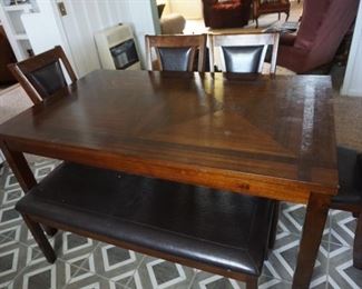 table with chairs, bench
