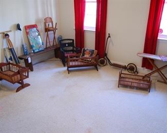 Toy room, antique scooter, doll beds, primitive bench