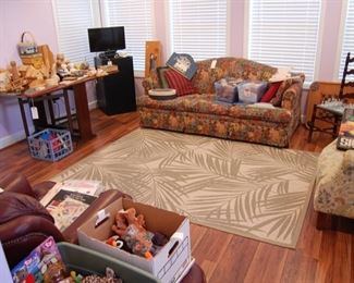 Downstairs sunroom-full of craft supplies, magazines and more