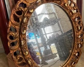 Rococo antique round mirror from the 19th century