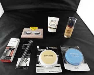Lot of covergirl beauty product, lashes, sunscreen.