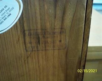 Stamp on back of clock