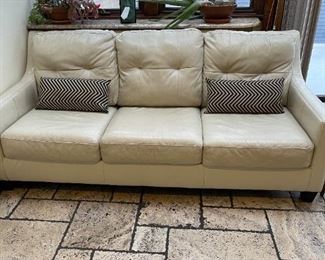 Leather couch. Super easy to clean. Really great condition.