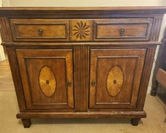 Beautiful cherry inlay accent chest with drawer and cabinet. Measures 40" x 20" x 36".

https://ctbids.com/#!/description/share/768227