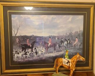 Photo of men preparing for a fox hunt. Measures 40" x 2" x 30" with frame. This is a print no artist name was found. Wooden carved and painted horse and jockey. Measures 8" x 4" x 12".

https://ctbids.com/#!/description/share/768229