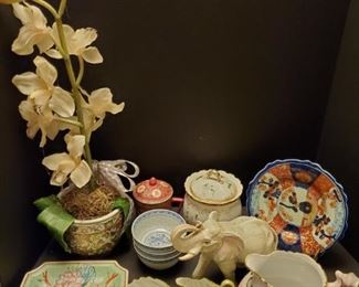 Asian decor lot includes a ceramic elephant 7", silk orchid 24", jars, plates and more.

https://ctbids.com/#!/description/share/768253