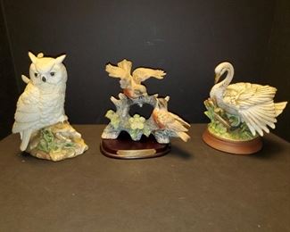 Collection of porcelain bird figures. Owl 8.5", robins 8", swan 8" https://ctbids.com/#!/description/share/768255