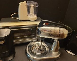 Two can openers a Black and Decker and an Oster. Dormeyer mixer does not come with bowl. Toaster oven measures 16" x 12" x 9". Crock pot is in good condition.

https://ctbids.com/#!/description/share/768282