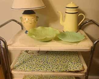 Three tier rolling cart squeaks a little when rolling. Measures 30" x 15" x 33". Small table lamp, 2 plates and a ceramic teapot.

https://ctbids.com/#!/description/share/768284