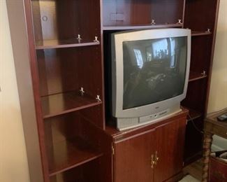 A Sauder Entertainment center with older RCA TV included. Featuring multiple shelves and a storage cabinet below with brass knobs for accents. 72x17x72 TV area: 32x21x29 Shelves: Top Center: 32x15x10 Sides: (left and right are identical measurements 18x15x13 top 18x15x16 18x15x16 18x15x17 bottom Cabinet: 32x20x24

https://ctbids.com/#!/description/share/768293