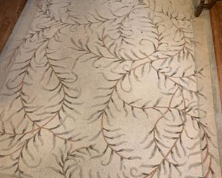 This is a hand made Chinese wool rug measuring 8x10' and is 100 percent wool. It has floral designs throughout it resembling vines

https://ctbids.com/#!/description/share/768308