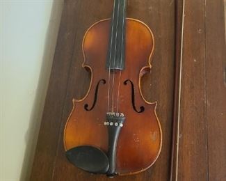 Anton Schroetter violin made in Germany. It seems to be dated October 1974. In ok condition needs some repairs. It was used as a wall decoration. Violin measures 8" x 2" x 23".
https://ctbids.com/#!/description/share/768313