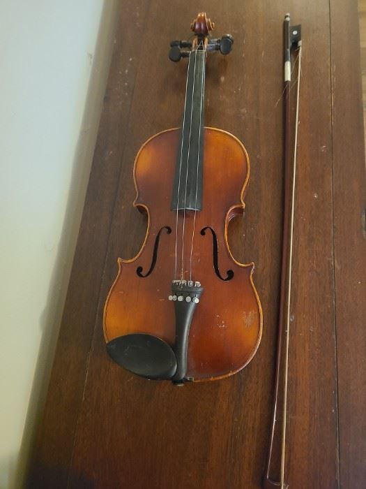 Anton Schroetter violin made in Germany. It seems to be dated October 1974. In ok condition needs some repairs. It was used as a wall decoration. Violin measures 8" x 2" x 23".
https://ctbids.com/#!/description/share/768313