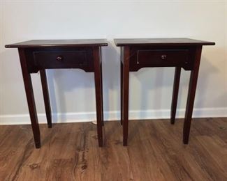 A matching set of wood end tables with single pull out draw with wood knob accents. The surfaces show signs of wear on both tables. 22x16x28 Drawer: 11x10x3

https://ctbids.com/#!/description/share/768315
