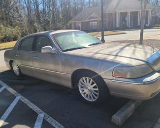 2003 Lincoln Town Car with V8 engine, leather interior, power windows and locks includes two sets of keys and has title. Car does not turn over, battery is dead. Family states the car mileage is low, but cannot be confirmed. Key fob will need battery replaced, car can be unlocked by key. Tires are dry rotted and back end is low to the ground. May need a tow truck to leave the property.

https://ctbids.com/#!/description/share/768319