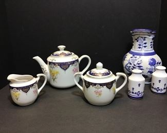 Andrea by Sadek 3 piece tea set. Teapot 7”. Blue and white flat back vase 8”, salt and pepper shakers 4”.  https://ctbids.com/#!/description/share/768257