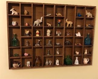 Shadow box filled with miniatures