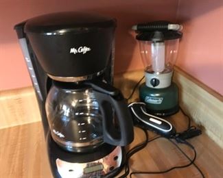 Coffee maker and Coleman lantern.