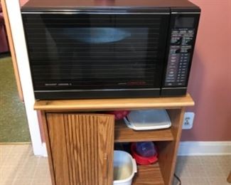 Microwave stand and super duper nice Sharp microwave. They don’t make them like this..