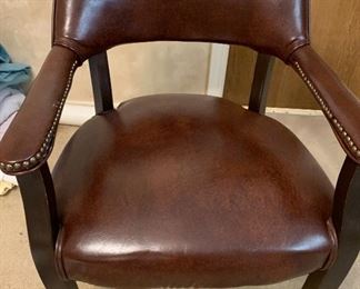 Nail head trimmed faux leather office arm chair