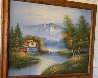 Framed mountain scene painting