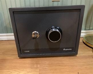 Sentry safe with key and combo