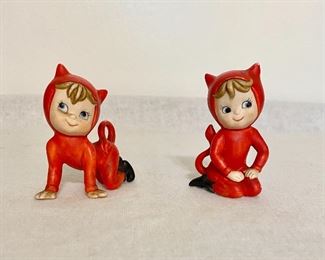 Vintage two little porcelain child like devil figurines. $18