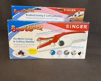 Like new in box "Singer" Sew Quick machine. $10