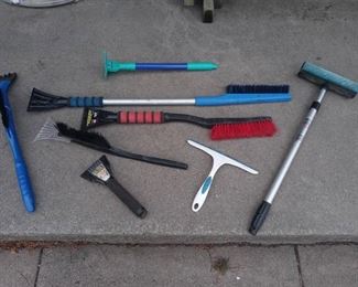 Lot of Ice scrapers, brushes and squeegee
