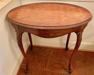 $220 - Inlaid and hand painted oval side table; AS IS - 31" W x 22.5" D x 29" H