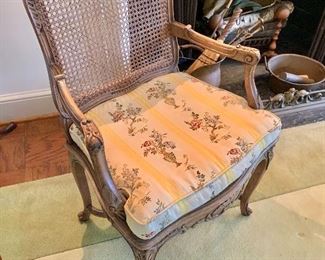 $175 - Vintage cane armchair with floral damask cushion, AS IS - 37.5" H x 24" W x 21" D, seat height is approx 17"