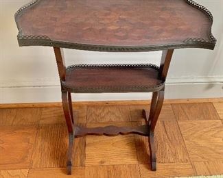 $195 - Vintage mahogany, inlaid, tiered stand with double brass gallery; 24.5" H x 21.5" W x 12.5" D