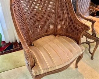 $395 - Louis XV style double cane barrel back and cane seat Bergiere with fitted cushion (cane is in good condition, cushion is stained); 44" H x 29.5" W x 26" D, seat height without cushion is approx 14"