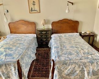 $700 - Pair of french provincial style twin beds; with headboard, side rails and short poster floorboards. each headboard is 43.5" H x 43" W and each bed is 77" long