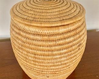 $95 - Woven basket with carved stone bird on lid; 12" H x 9" W