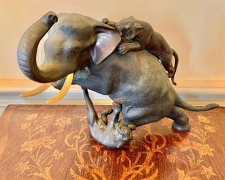 $450 - Japanese bronze table sculpture of African elephant attacked by tigers; 10" H x 15" W x 9" D