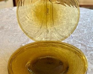 $100 - Four blown glass chargers; three are 12", one is 11"